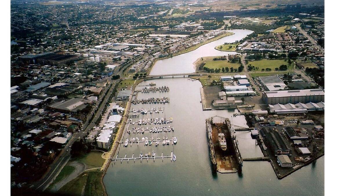 The lower reach of Throsby Creek, with the Newcastle Cruising Yacht Club's marina being developed and before the floating dock Muloobinba was towed away to its new home.  