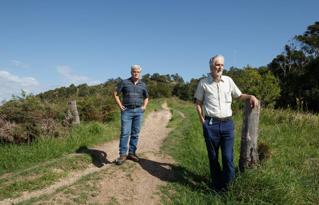 HAVEN: Munibung Hill Conservation Society members Fergus Hancock and Stuart Carter on the eastern slope. Picture: Max Mason-Hubers
