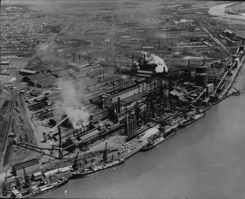 Ships at the Newcastle BHP steelworks' berths along the Hunter River. 