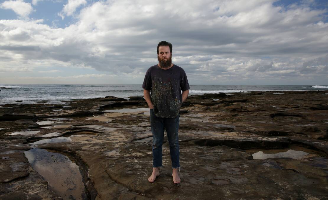 WATER MAN: Artist James Drinkwater on the rock platform at the Cowrie Hole. Picture: Simone De Peak