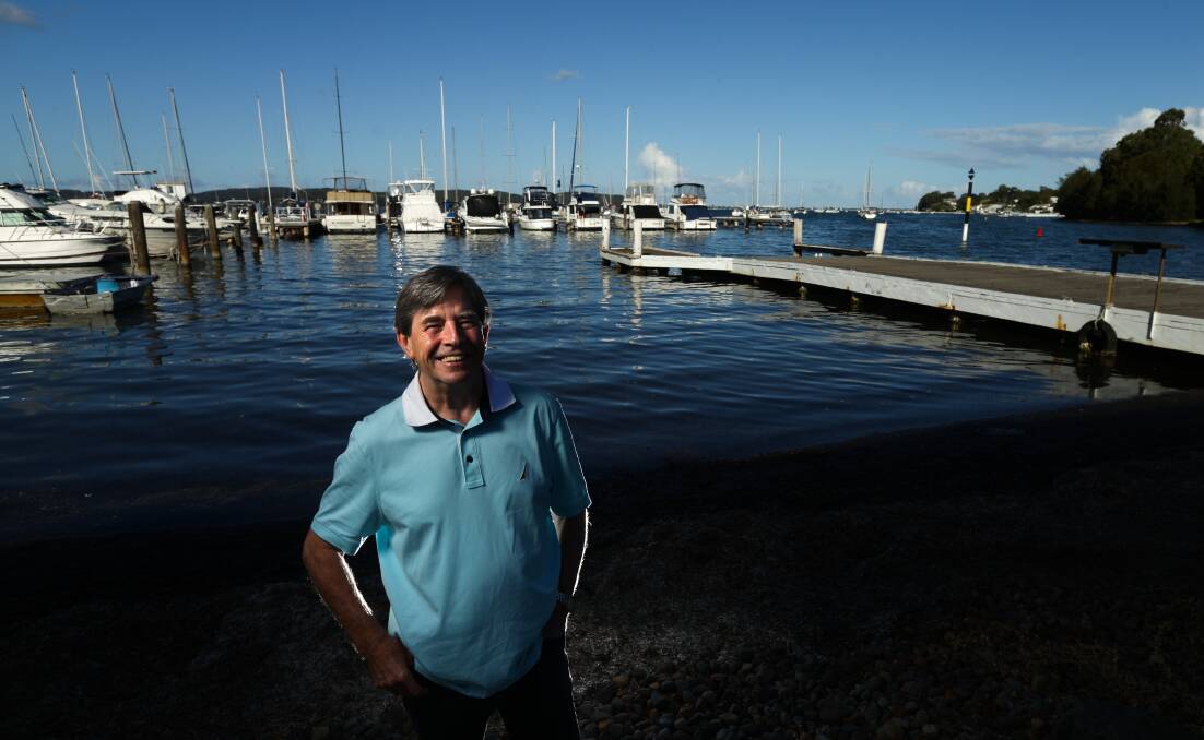 John Paul Young on the shores of Lake Macquarie. Picture: Jonathan Carroll