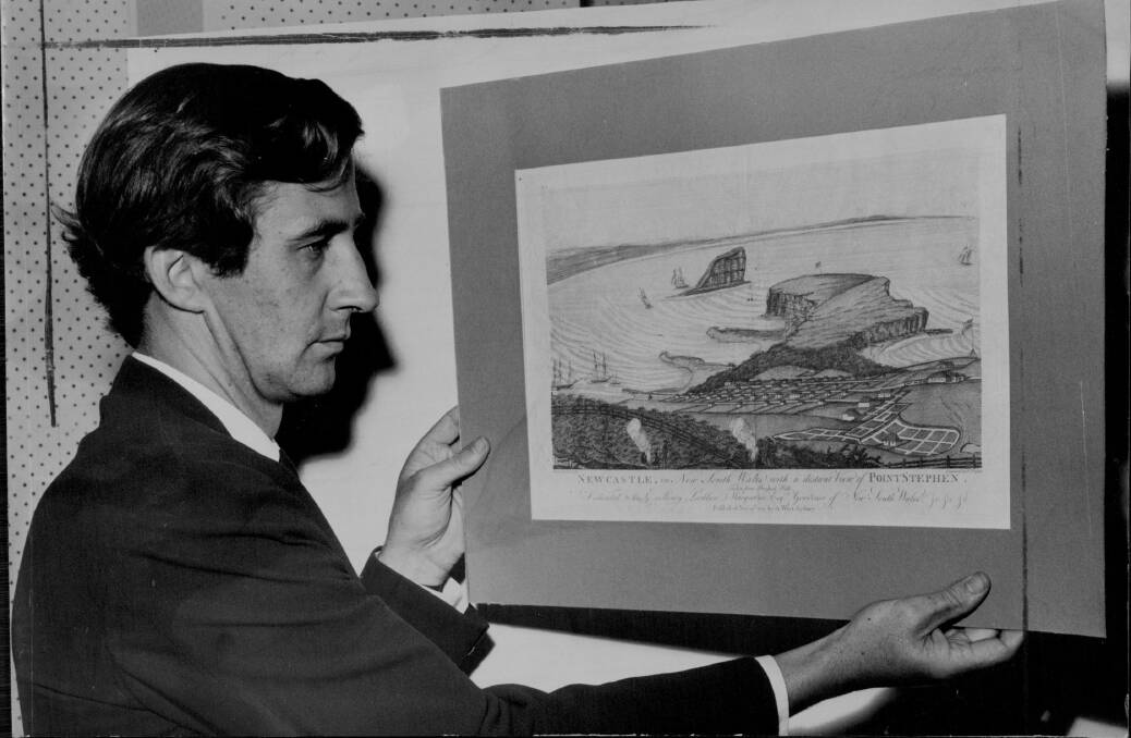David Thomas, as the gallery director in 1971, holds a historic engraving of early Newcastle.
