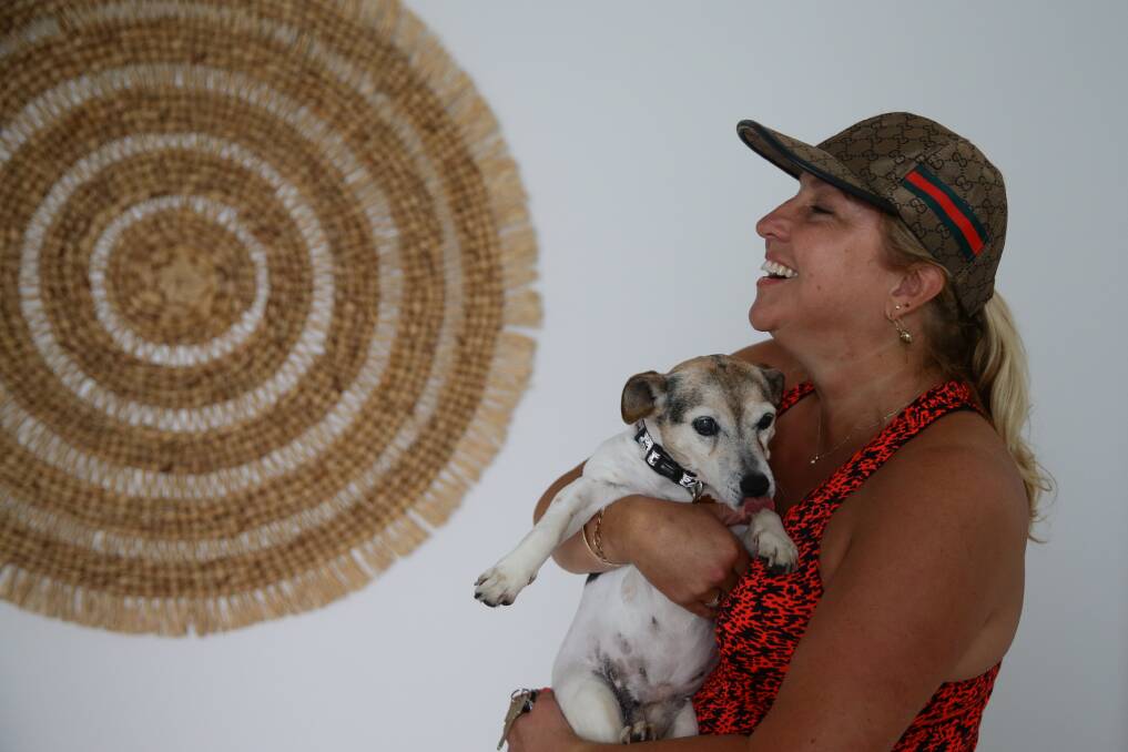 REUNITED: Michelle Robinson with Suzie, just after the foxy was rescued. Pictures: Jonathan Carroll 