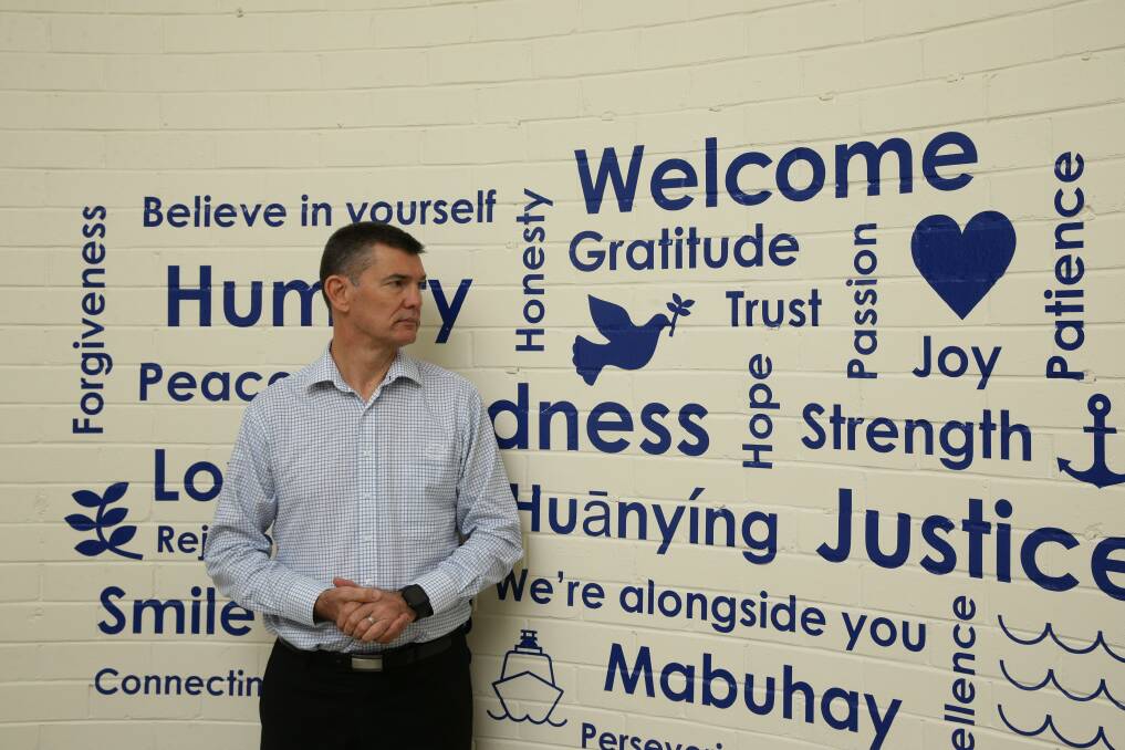  The Reverend Canon Garry Dodd at the entrance to Newcastle's Mission to Seafarers. Picture: Jonathan Carroll