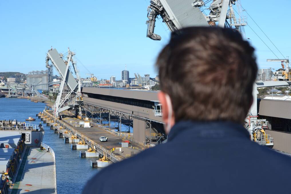 Marine pilot Captain Mark Webb watches as the 'Anikitos' is edged towards the wharf. Picture: Scott Bevan