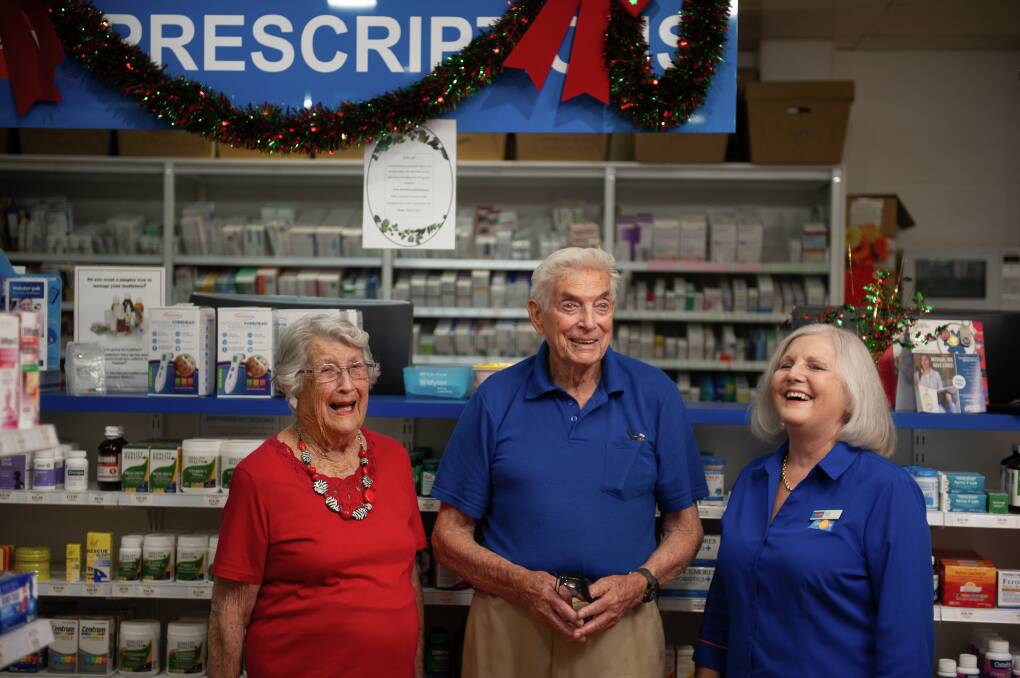 LAUGHTER AS MEDICINE: "Dot" Brittliff, Bill Johnson and morning tea organiser Vicki Raciti at the pharmacy. 