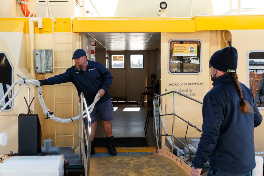 Steve Hoggart and crew mate Alex Sutherland prepare the ferry for departure from Newcastle. Picture by Max Mason-Hubers 