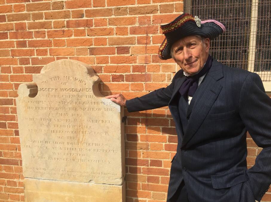 Jonathan King with the "Carrington" memorial, which was commissioned by his great-great grandfather, Phillip Parker King. 