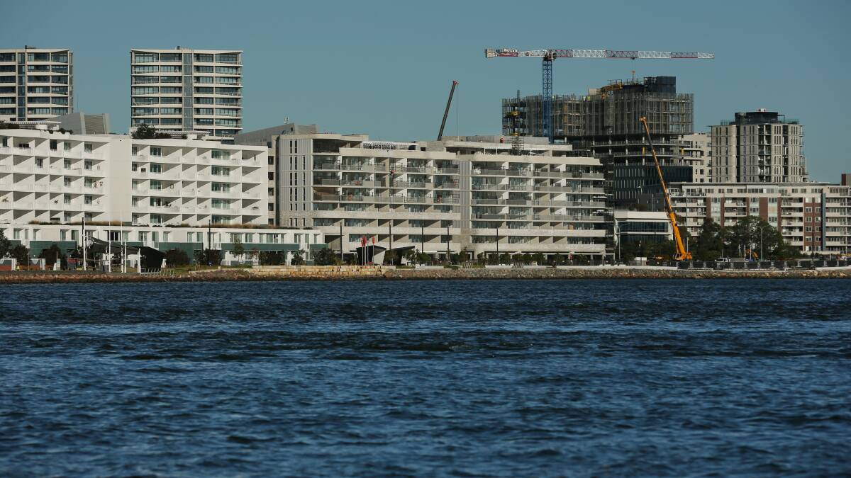 The rows of residential and commercial buildings that have sprung up near the harbour at Honeysuckle. Picture: Simone De Peak
