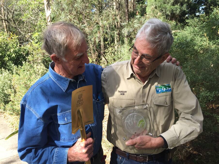 Gardening award winners and friends John Le Messurier and Dr Paddy Lightfoot with their trophies. Picture: Scott Bevan