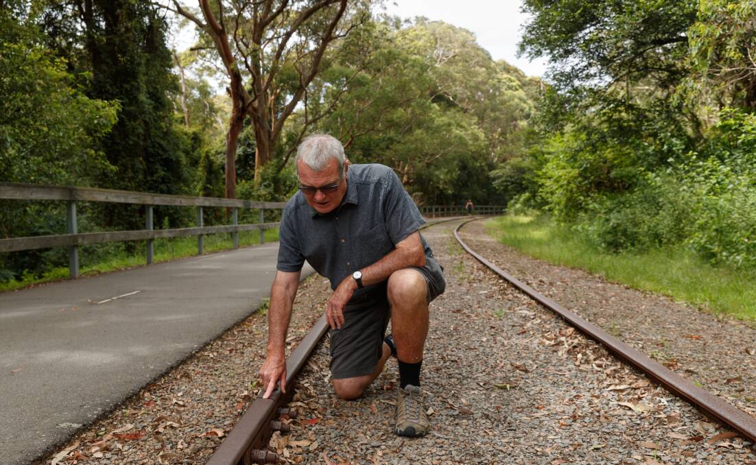 HERITAGE: Local rail historian and author Ed Tonks inspects the old line. Picture: Mason Mason-Hubers 