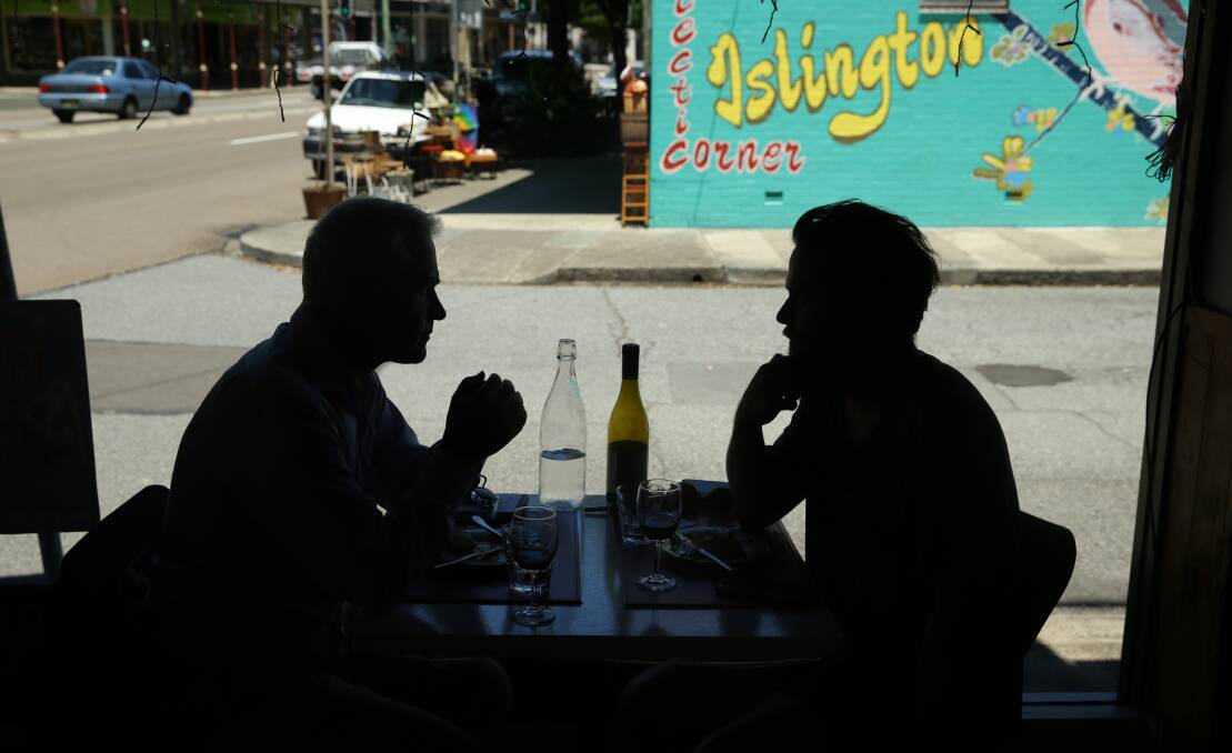 LIGHT AND SHADE: Artist James Drinkwater at lunch with Scott Bevan. Picture: Jonathan Carroll.