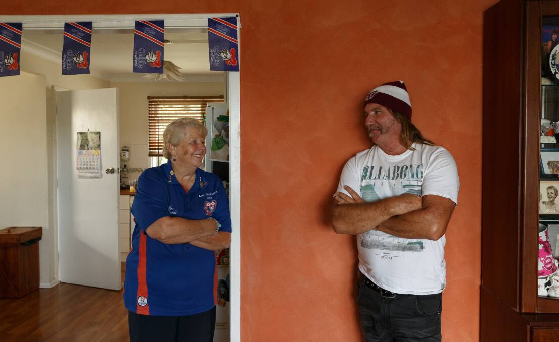 TWO TRIBES: Knights Nanna Wendy Hepplewhite and her Manly supporting son-in-law, Darrell Fenwick, in their Woodberry home. Picture: Max Mason-Hubers