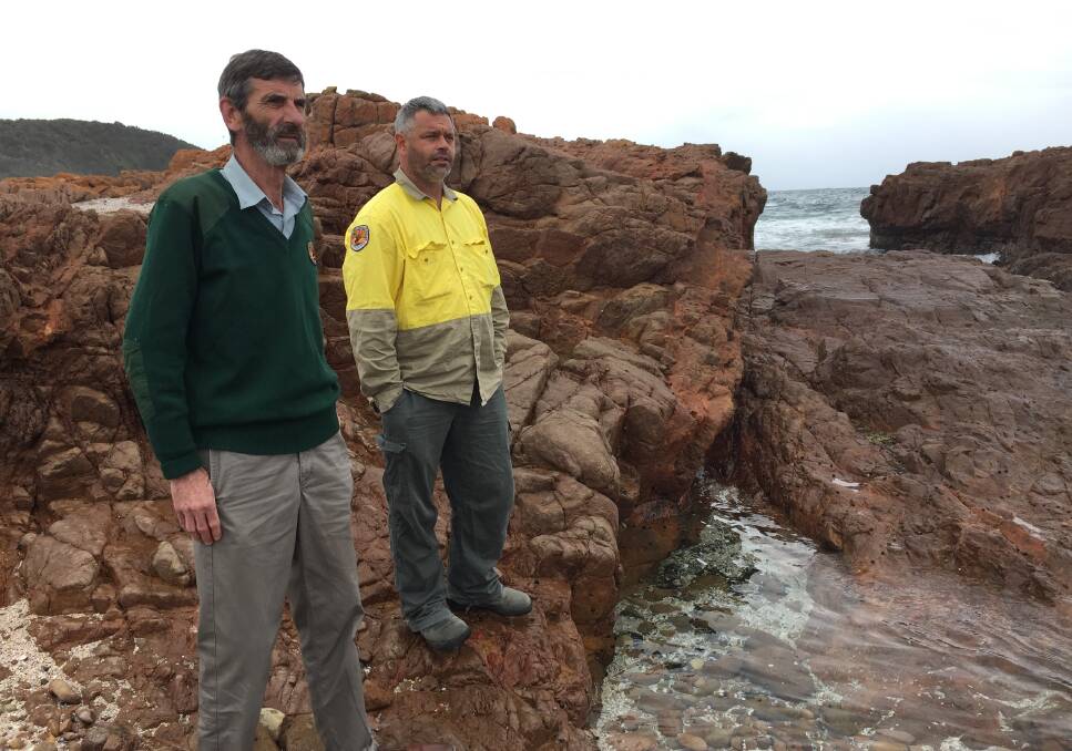 NSW National Parks and Wildlife Service's Andrew Bond and Jamie Tarrant, a proud Worimi man, at Big Rocky. 
