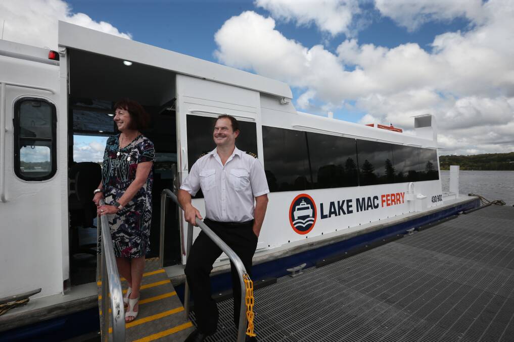 FERRYING THE FUTURE: Mayor of Lake Macquarie, Cr Kay Fraser, and Peter Hanrahan, from Lake Macquarie Cruises, with the new ferry soon to be seen regularly on the water. Picture: Simone De Peak 