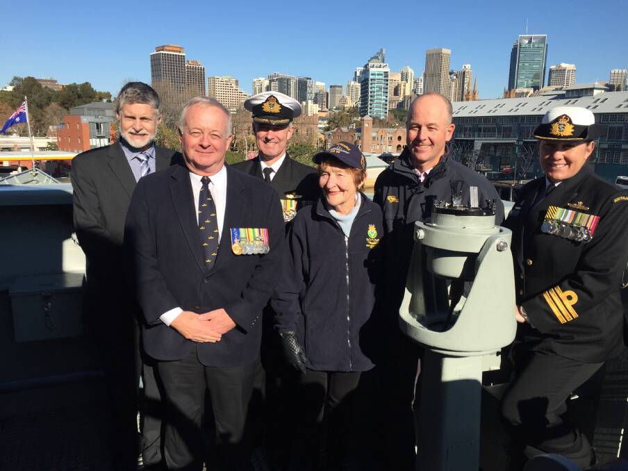 Former commanding officers of HMAS Newcastle, Commander Steve Hamilton, Commodore Gerry Christian, Commodore Justin Jones, and Captain Nicholas Stoker, with the ship's "launching lady" Margaret McNaughton (centre), and Commander Anita Sellick (right). Picture: Scott Bevan