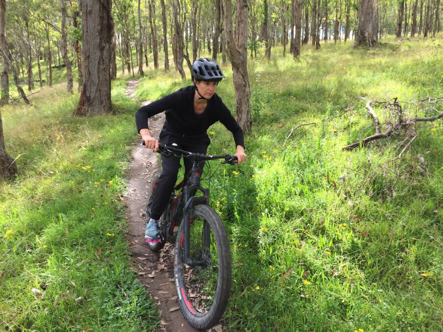 Chloe Chick mountain bike riding on Dungog Common. Picture: Scott Bevan