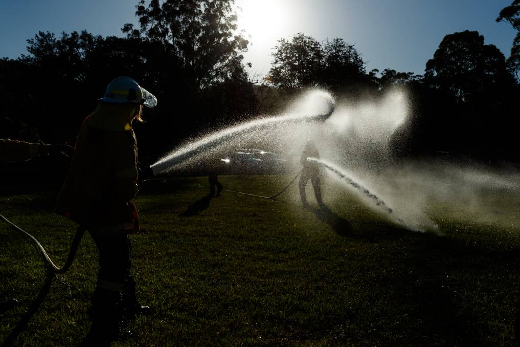TRAINING: Members of the Martinsville brigade participating in hose drills. Picture: Max Mason-Hubers 