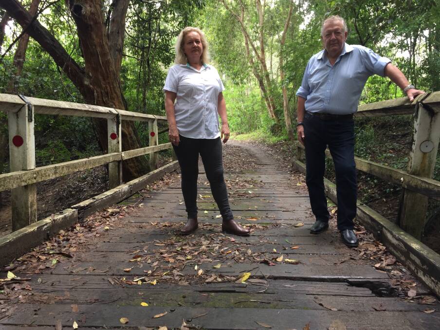 Maggie and Bill Kent on the bridge in Pointers Road, near Martinsville. Picture: Scott Bevan