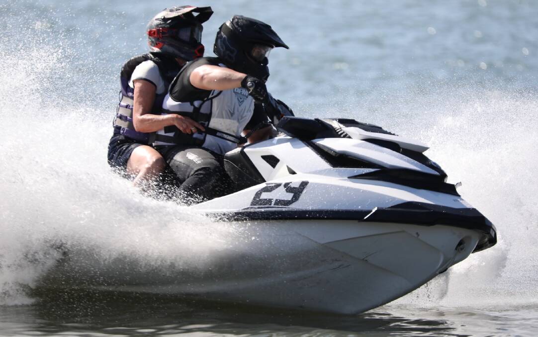 POWERING: The Lake mayor on the back of a jet ski. Picture: ozpwc.com