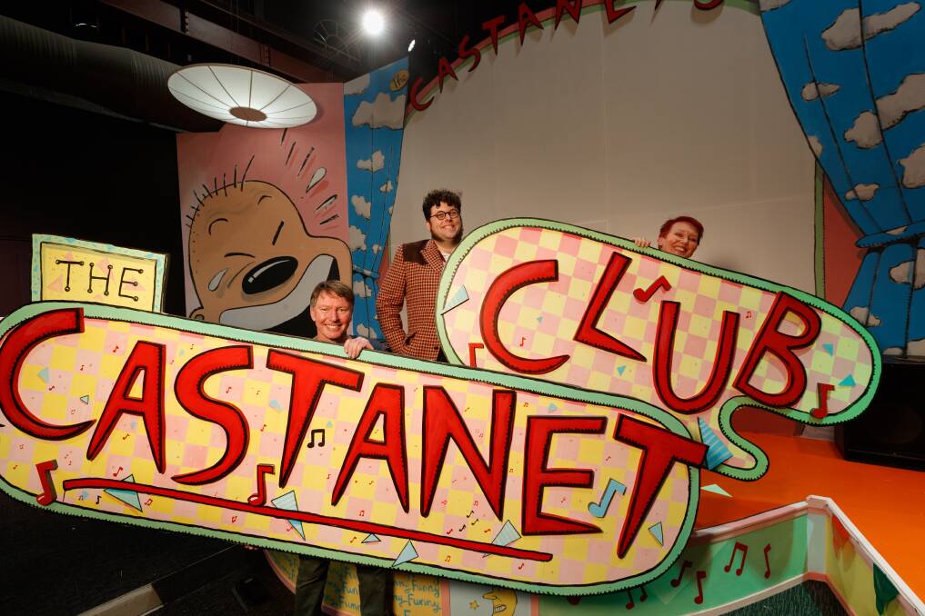 Artist Michael Bell, curator David Hampton and Newcastle Museum director Julie Baird hold the recreated Castanet Club sign. Picture: Max-Mason Hubers 