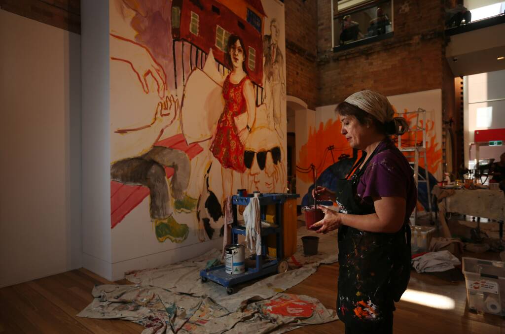 Wendy Sharpe working on her Maitland version of "Red Dress". Picture: Simone De Peak