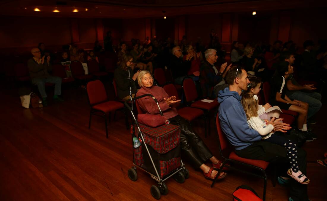Audience member Carolyn Griffin applauds the performers. Picture: Jonathan Carroll