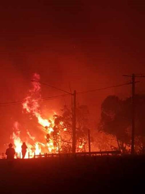ABLAZE: The bushfire near Wangi Road at Lake Macquarie. Picture: Courtesy, Wallarah Rural Fire Brigade