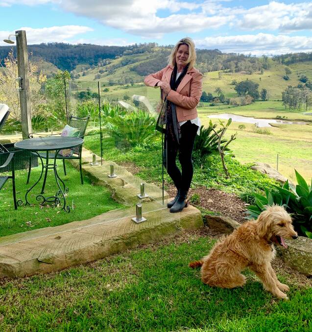 TREE CHANGE: Dungog real estate agent Dee Braithwaite, at a property on the market, Slowdance, says city dwellers are seeking the "fresh country air". Picture: Supplied 