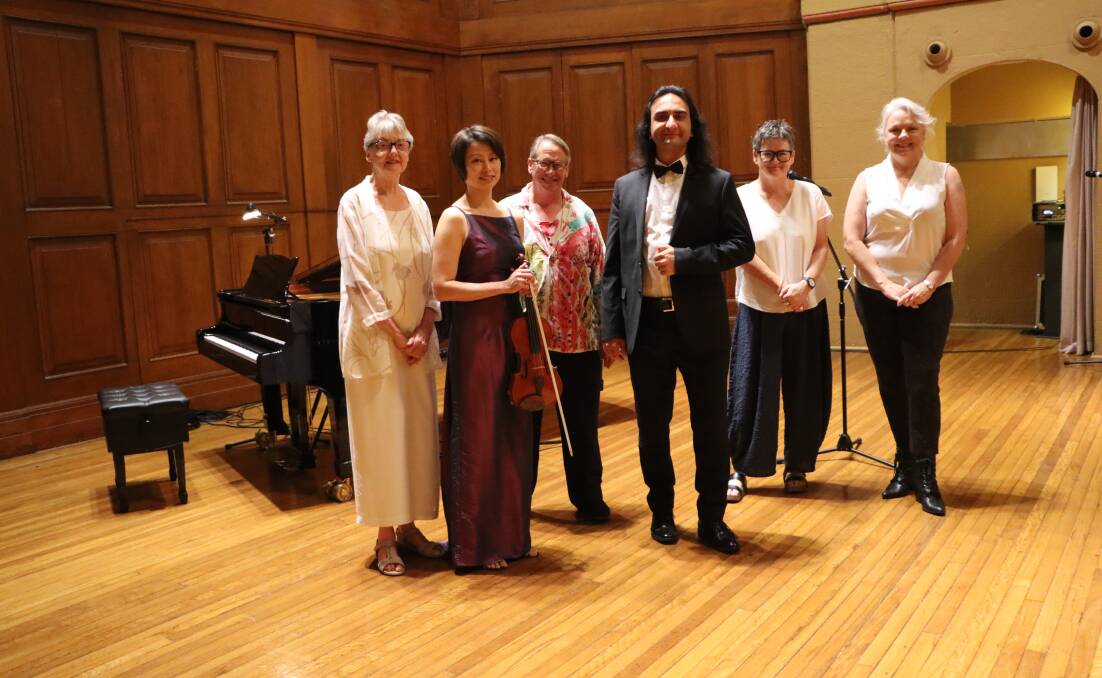 MAKING MUSIC: Pianist Mercia Buck, violinist Catherine Sheng-Cooper, MC Michael Blaxland, tenor Sam Elmi, Civic Theatre manager Leonie Wallace, and Cr Carol Duncan in City Hall. Picture: Supplied 