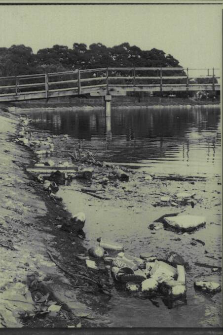 MURKY PAST: The area near the footbridge in 1981, with no mangroves and a lot of rubbish along the banks. 