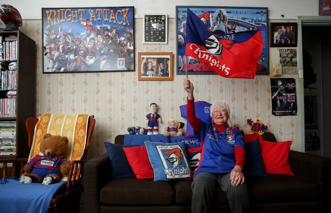 LOYAL: Elaine Roberts, a founding member of the Knights Nannas supporters' group, in her lounge room. Picture: Marina Neil