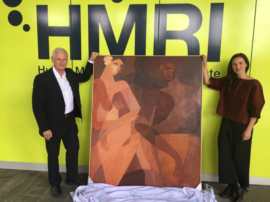 FROM THE GUT: HMRI's 2020 Researcher of the Year, Professor Nick Talley, and artist Brittany Ferns with the painting, 'Conversation', which was inspired by the researcher's work. Pictures: Scott Bevan 