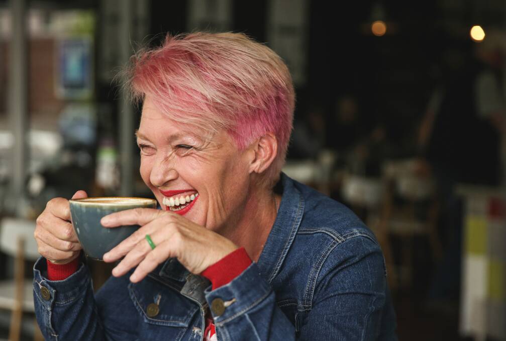 HAPPY DIRECTOR: Julie Baird wearing a smile and an engagement ring. She is getting married in June. Picture: Marina Neil  