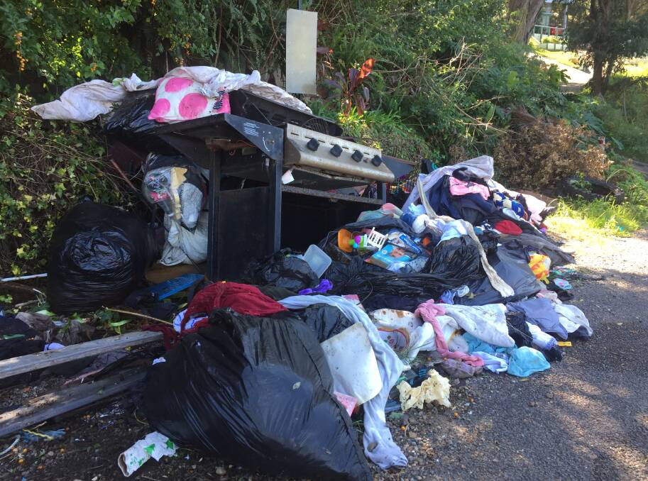 Household waste left on Beach Road, Wangi Wangi. 