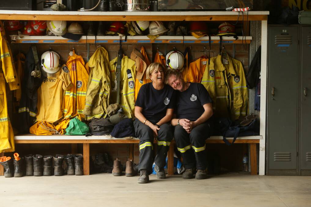 Wollombi Volunteer Bush Fire Brigade members and local publicans Cathie and Chris Books. Picture: Jonathan Carroll 