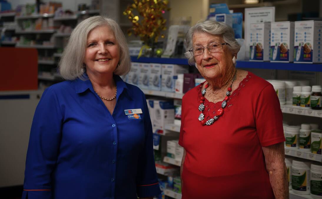 Vicki Raciti and Doris "Dot" Brittliff at the Dora Creek pharmacy. Picture: Marina Neil
