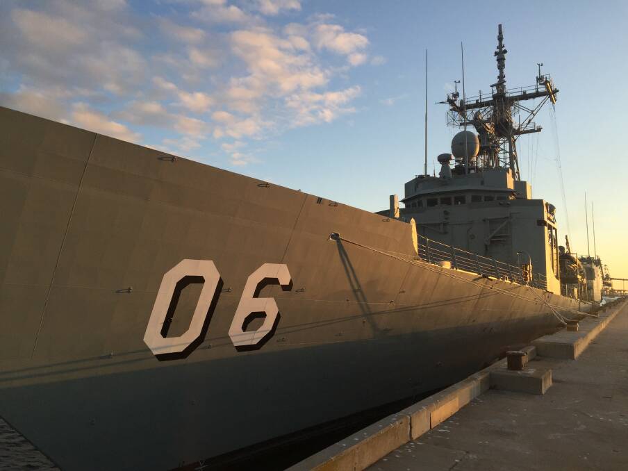 HEADING HOME: HMAS Newcastle berthed at the navy wharf at Eden, on the NSW south coast, before sailing to Sydney for the last time. Picture: Scott Bevan