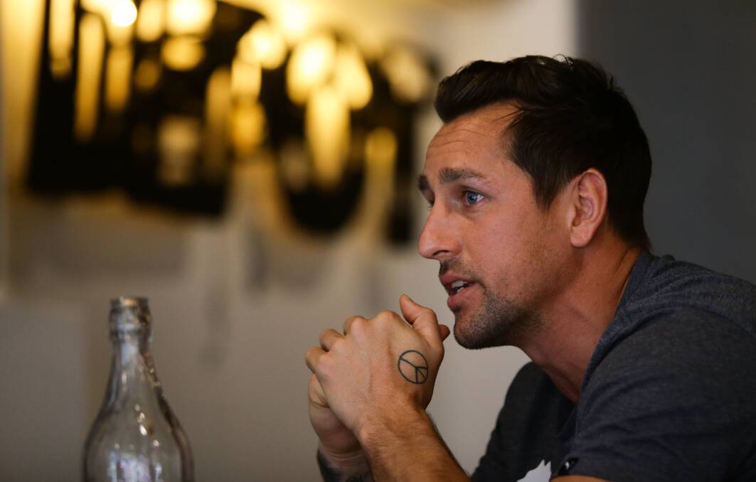 REFLECTING: Star rugby league player Mitchell Pearce says the pace of life in Newcastle suits him. Picture: Jonathan Carroll 
