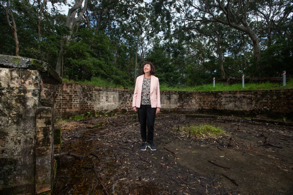 Lake Macquarie Mayor Kay Fraser inspects the gun emplacement. Picture: Marina Neil