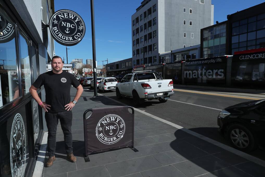 Newy Burger Co owner Ben Neil outside his restaurant in Hunter Street. Picture: Peter Lorimer