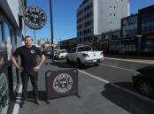 Newy Burger Co owner Ben Neil outside his restaurant in Hunter Street. Picture: Peter Lorimer