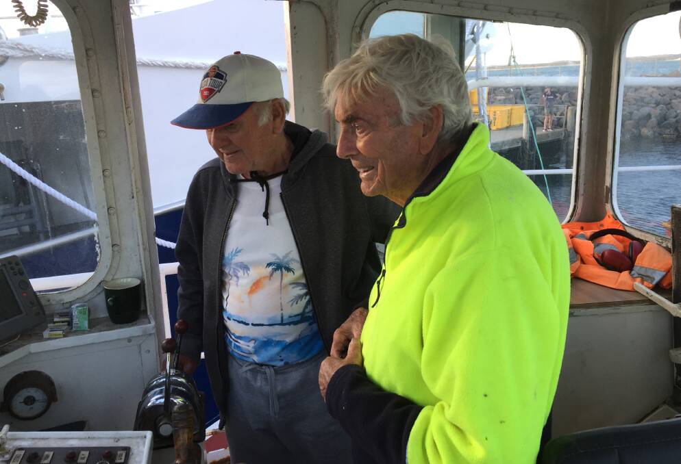 Ivan Skoljarev and Bill Johnson on board the 'Betts Bay'. Picture: Scott Bevan