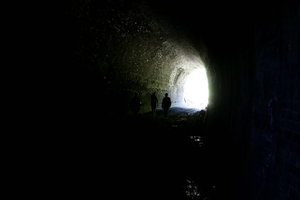 Walking through a historic tunnel on the proposed Richmond Vale Rail Trail. Picture: Jonathan Carroll