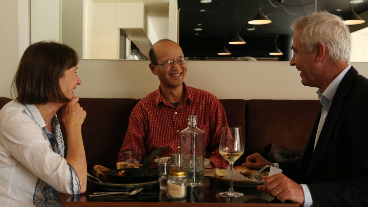 MUSIC THE FOOD OF LOVE: Musicians and medicos Judy and Stan Chen at lunch with Scott Bevan. Picture: Simone De Peak