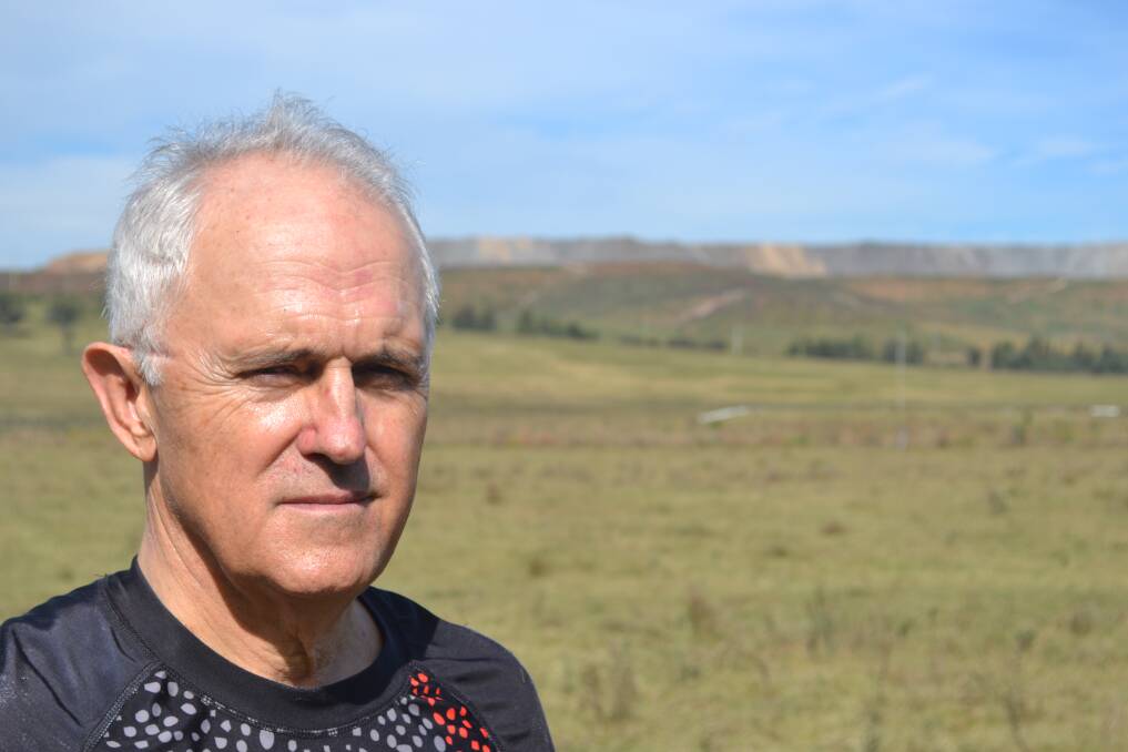 CHANGED LANDSCAPE: Malcolm Turnbull near the Hunter River, with mining country in the background. Pictures: Scott Bevan. 