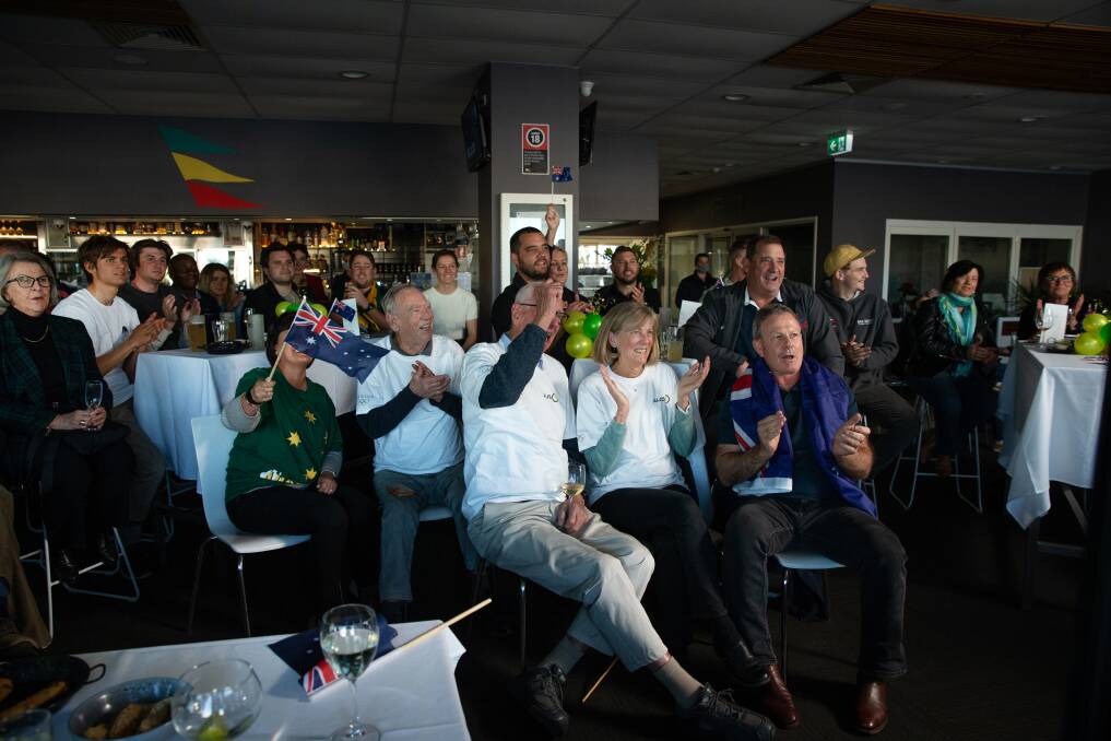 Sailor Will Ryan's family and supporters watching the race on the television at Newcastle Cruising Yacht Club. Picture: Marina Neil