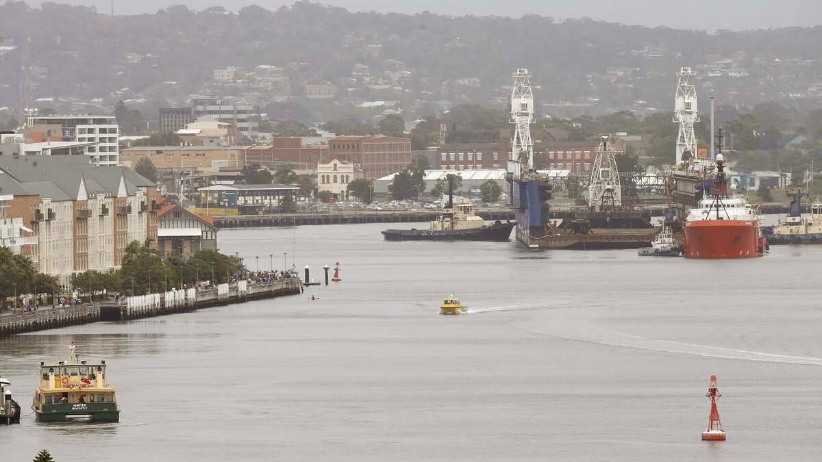 The floating dock "Muloobinba" leaving Newcastle harbour in 2012. Picture: Dean Osland