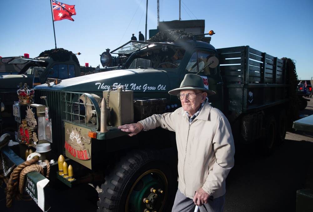 HISTORIC: David Needham with a World War Two Studebaker truck on display at Fort Scratchley. Pictures: Marina Neil 