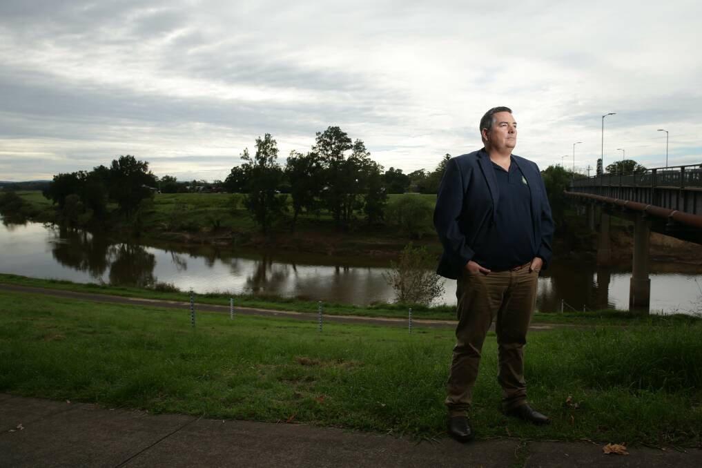 Shane Hamilton, businessman and the president of Maitland Business Chamber, beside the Hunter River. Picture: Jonathan Carroll 
